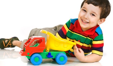 little boy with toy car